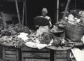 Indonesian woman selling fresh vegetables at the market in Semarang. Film Photography