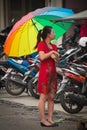 Indonesian woman with umberella, Medan, Indonesia