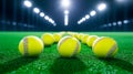 Indoor Batting Cage with Softballs Brightly lit indoor batting cage rows of softballs athletic competition precision Royalty Free Stock Photo