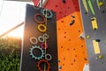 Indoor bouldering and climbing wall for training at modern gym. Gears and toy climbing wall for children Royalty Free Stock Photo