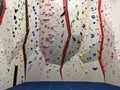 Indoor bouldering and climbing wall for training at a modern gym Royalty Free Stock Photo