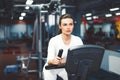 Indoor cycling woman doing cardio workout biking on indoors gym bike. Royalty Free Stock Photo