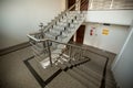 Indoor granite Staircase With stainless steel Handrail Royalty Free Stock Photo