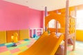 Indoor kids playground room for children play fun space in condominium Royalty Free Stock Photo