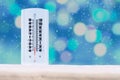 Indoor and Outdoor Thermometer that Shows a very low temperature on Fahrenheit and Celsius with defocus background and falling Royalty Free Stock Photo