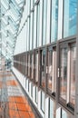 Indoor pedestrian bridge with windows.