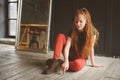 Indoor portrait of beautiful young redhead woman Royalty Free Stock Photo