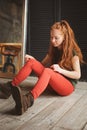 Indoor portrait of beautiful young redhead woman Royalty Free Stock Photo