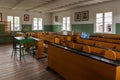 Ancient primary school classroom with antique desks Rumsiskes Etnographic museum Lithuania Royalty Free Stock Photo