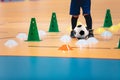 Indoor soccer players training with balls. Indoor soccer sports hall. Futsal league Royalty Free Stock Photo