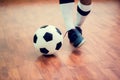 Indoor soccer sports hall. Football futsal player Royalty Free Stock Photo