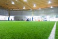 Indoor soccer training field blur abstract background Royalty Free Stock Photo