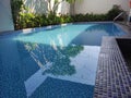indoor swimming pool with garden around