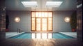 Indoor swimming pool in a luxury home. Tiled walls and floor, skylights, wall lamps, plants in floor pots, large window Royalty Free Stock Photo
