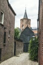 Old dutch houses with church tower Royalty Free Stock Photo