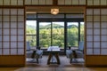 Indoor view of a traditional Japanese style hotel room, terrace with tea table and retro Japanese decoration, Arima, Japan Royalty Free Stock Photo