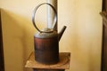 Indoor vintage kettle on the iron stove