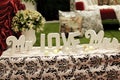 Indoors wedding reception venue with decor, selective focus on flowers Royalty Free Stock Photo