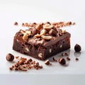 Indulge in allure brownie slice with hazelnuts on white canvas Royalty Free Stock Photo