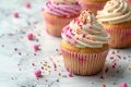 Delicious gluten-free cupcakes decorated with colorful icing and sprinkles Royalty Free Stock Photo