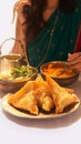 Indulge the classic snack combo of Veg Samosa and Jalebi.