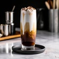 Creamy, frothy drink in a tall glass with milk, seltzer, and chocolate syrup