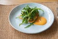 Crab Cake Dinner Recipe: Savor the Delight of Succulent Crab Cakes, Served with a Refreshing Rocket Salad Royalty Free Stock Photo