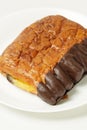 Indulge in our delectable chocolate banana pastry, featuring a rich blend of sweet banana cream and chocolate.