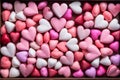 Indulge in sweet romance of box filled with delectable pink heart-shaped candies Royalty Free Stock Photo