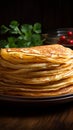 Indulge in the texture of thin pancakes on a rustic plate