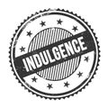 INDULGENCE text written on black grungy round stamp Royalty Free Stock Photo