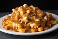 indulgent close-up shot of poutine made with crispy tater tots, savory gravy, and a generous serving of cheese curds