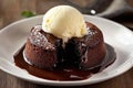 Decadent Molten Chocolate Cake with Cold Vanilla Ice Cream on Rustic Wooden Table Royalty Free Stock Photo