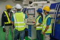 Factory workers and technician having working brief from foreman