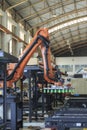 Factory 4.0 concept: View of vacuum gripper on palletizing robot in smart warehouse