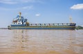 Industrail ship in the middle of Musi River, Palembang, Indonesia.