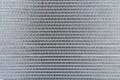 Industrial abstract steel background. The texture of the new aluminum car radiator Royalty Free Stock Photo