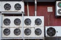 Industrial air conditioning and ventilation systems on the wall of a building