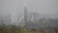 Industrial air pollution from smokestacks. Factory chimney blowing pollution in environment. Toxic smoke from chimney in industria