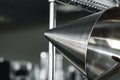 Industrial aluminum colanders on professional kitchen close up