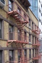 Industrial apartment building with yellow plastered wall in New York Royalty Free Stock Photo