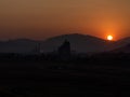 Industrial area east of Reno Nevada during a smoky smoggy sunrise. Royalty Free Stock Photo