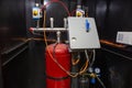 Industrial automatic fire extinguishing system, cabinet with balloon of fire-fighting foam, nitrogen and control unit Royalty Free Stock Photo