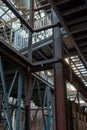 Industrial background, old abandoned factory hall with stairs and day light Royalty Free Stock Photo