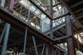 Industrial background, old abandoned factory hall with stairs and day light Royalty Free Stock Photo