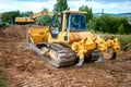 industrial backhoe truck moving earth and soil in quarry constru Royalty Free Stock Photo