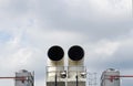 Industrial big chimneys with a air conditioner hot coil with white clouds, industrial background, environment concepts Royalty Free Stock Photo