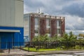 Industrial building against gray sky