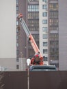 Industrial building. A crane constructing a new building in the centre of the city