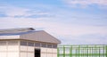 Industrial building with green metal outline of warehouse in construction site area in panoramic view Royalty Free Stock Photo